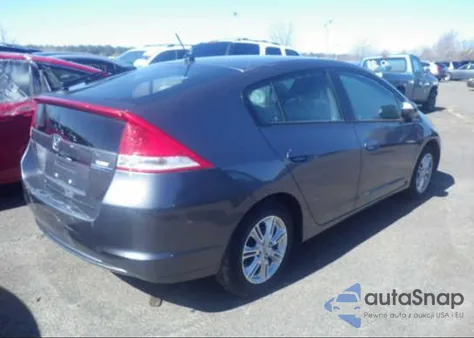 2010 Honda Insight Ex z USA, uszkodzony, nr VIN JHMZE2H79AS033203